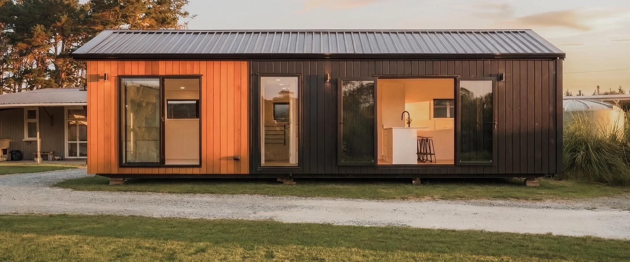 A home photographed at golden hour, the last usable light of the day